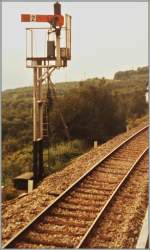 Signale/238626/ein-formsignal-in-marling-an-der Ein Formsignal in Marling an der Strecke Mals - Meran.
21. Juli 1984